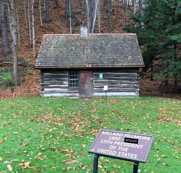 A picture of a replica of the cabin Millard was born in